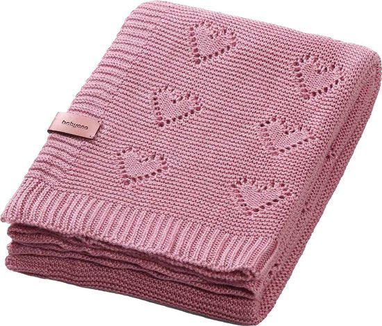 Roze gebreide wiegdeken van bamboe met hartjes