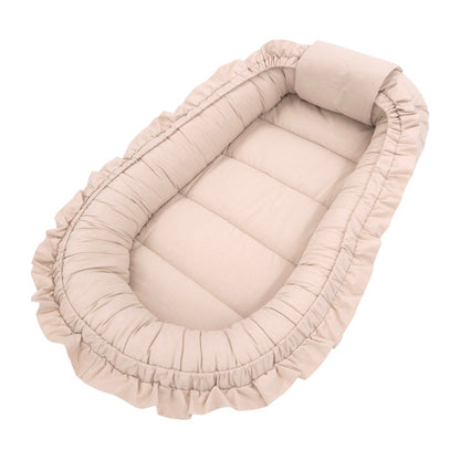 Soosie babynestje FRILL UP Beige, zijaanzicht met ruche