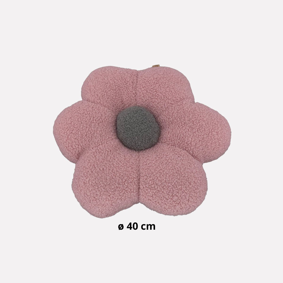 Detail van het zacht roze teddy bouclé bloemkussen