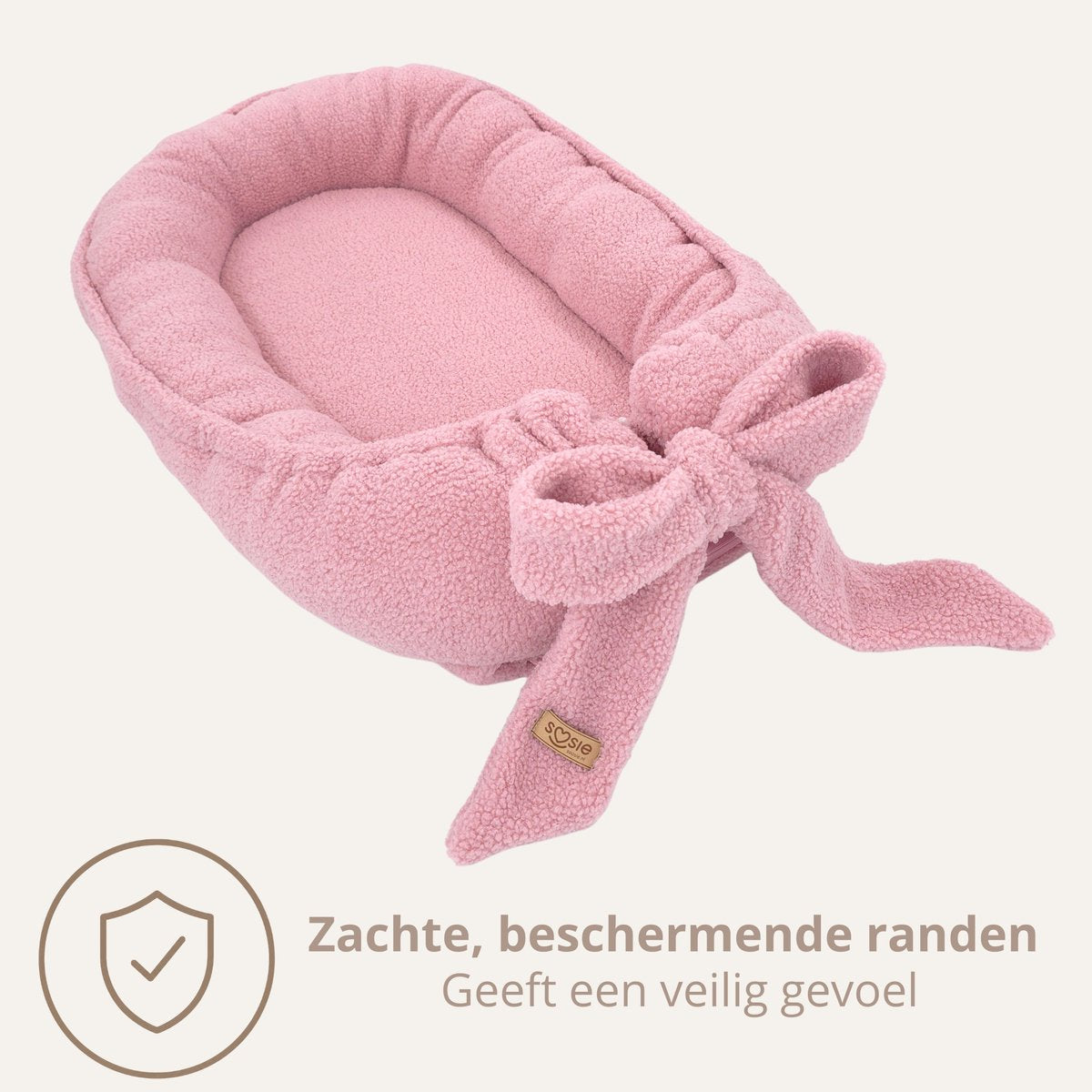 Soosie Teddy Bow babynestje met strik, roze — zachte beschermende randen